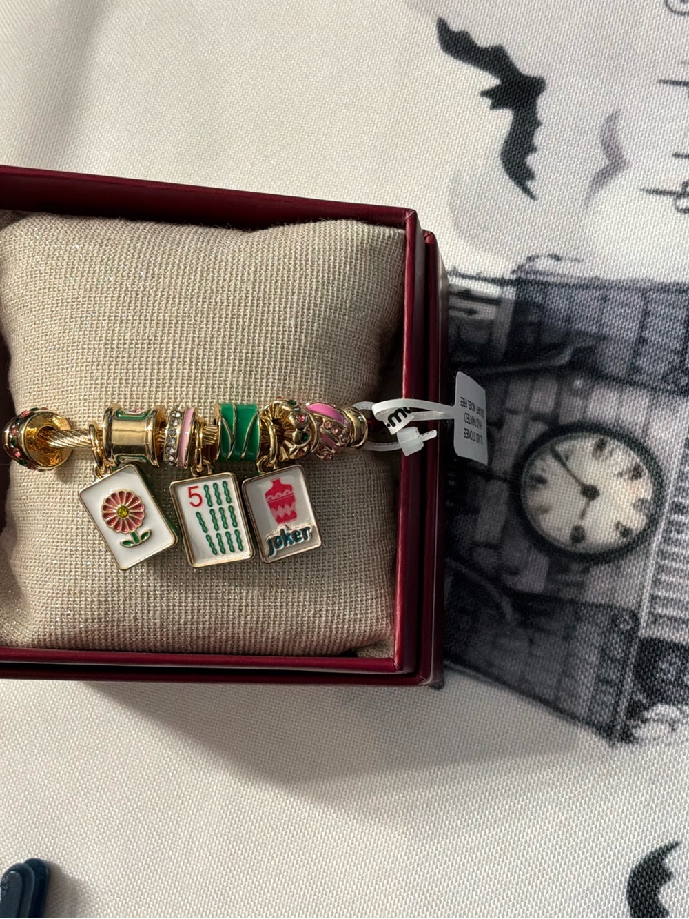 Gold-Tone Mahjong Charm Bracelet with Green and Pink Enamel Accents